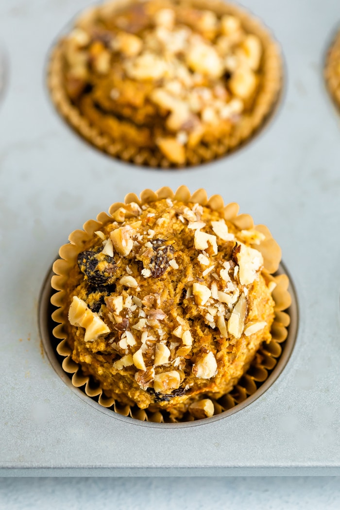 Oat bran muffin topped with walnuts.