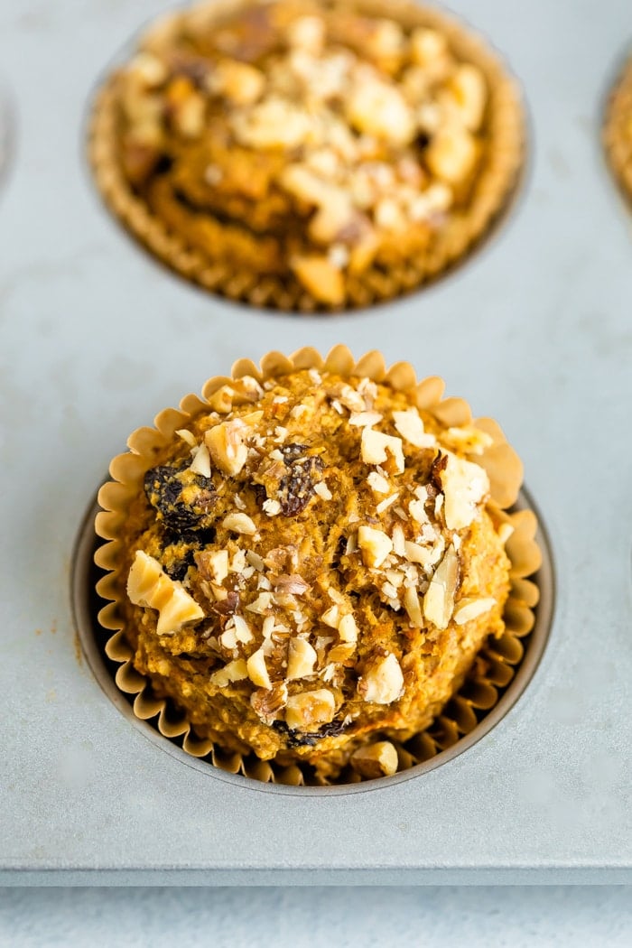 Oat bran muffin topped with walnuts.