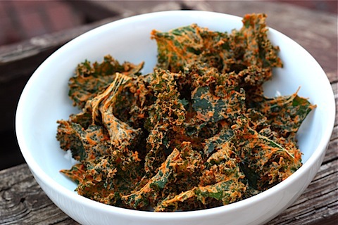 Bowl of cheesy kale chips.