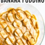 Peanut butter banana pudding topped with slices of bananas and a drizzle of peanut butter.