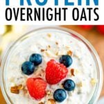 Jar of overnight oats topped with almonds and berries.
