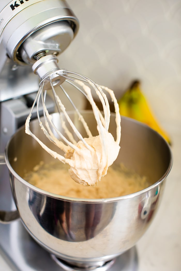 Whisk on a stand mixer with a dollop of peanut butter pudding from whisking.