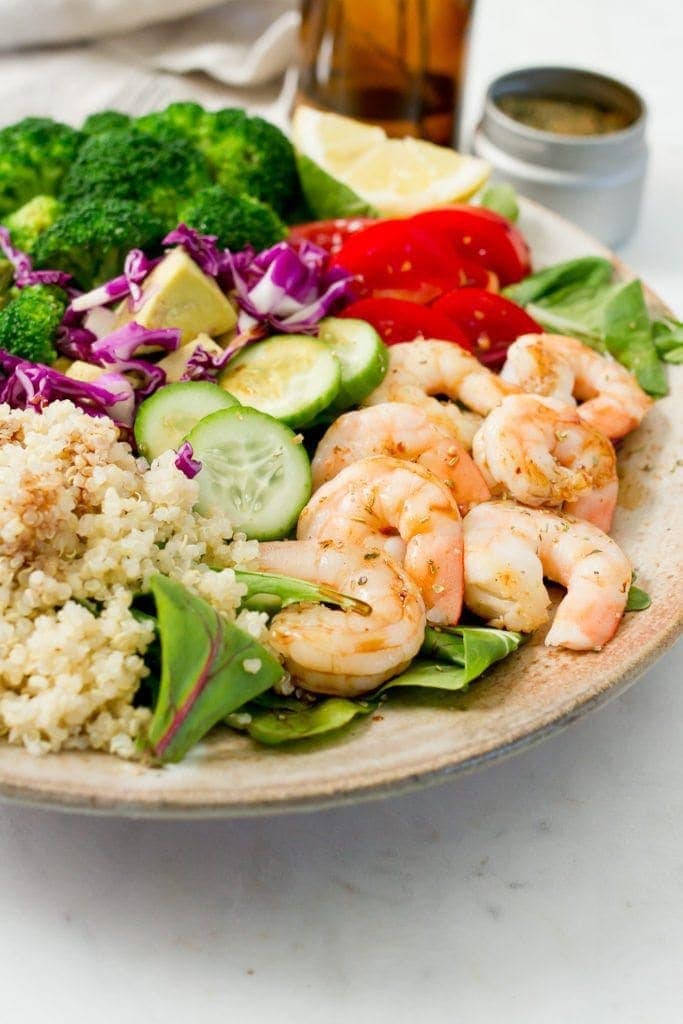 A meal-sized shrimp salad with cooked shrimp, quinoa, blanched broccoli and roasted asparagus! Prepare everything ahead of time and throw it into a bowl for a quick and easy lunch or dinner.