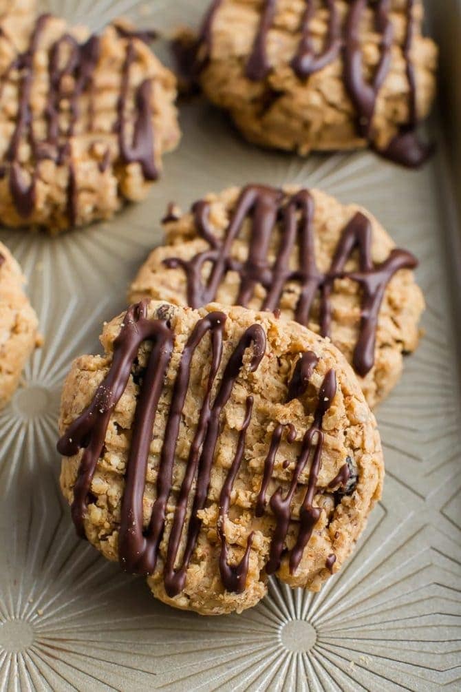 5-ingredient peanut butter granola cookies drizzled with chocolate.