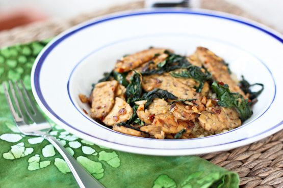 A flavorful one skillet meal with tempeh, sautéed kale and coconut aminos.