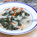 Clean Food Autumn Harvest Soup in a bowl with blue trim.