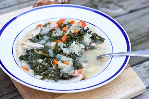 Clean Food Autumn Harvest Soup in a bowl with blue trim.