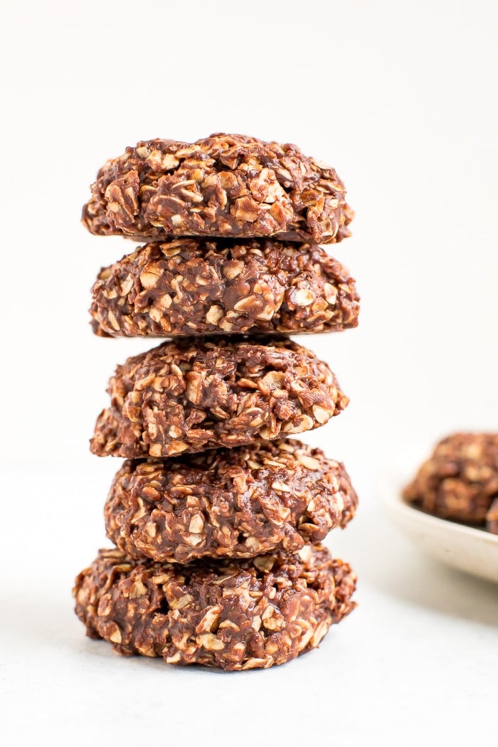 Stack of peanut butter chocolate healthy no bake cookies.