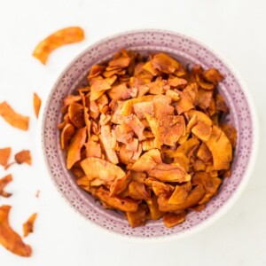 Vegan Coconut Bacon in a light pink bowl.