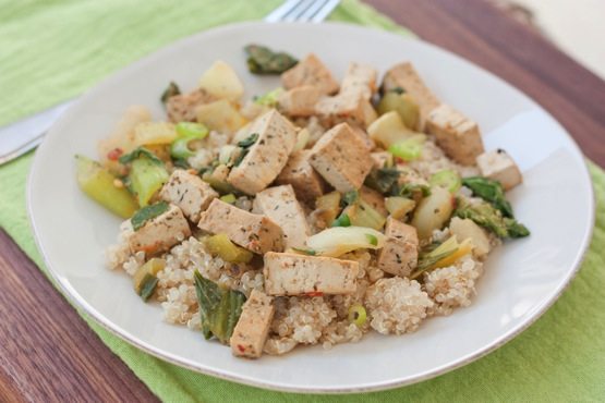 Bok choy stir-fry with tofu served over a bed of quinoa.