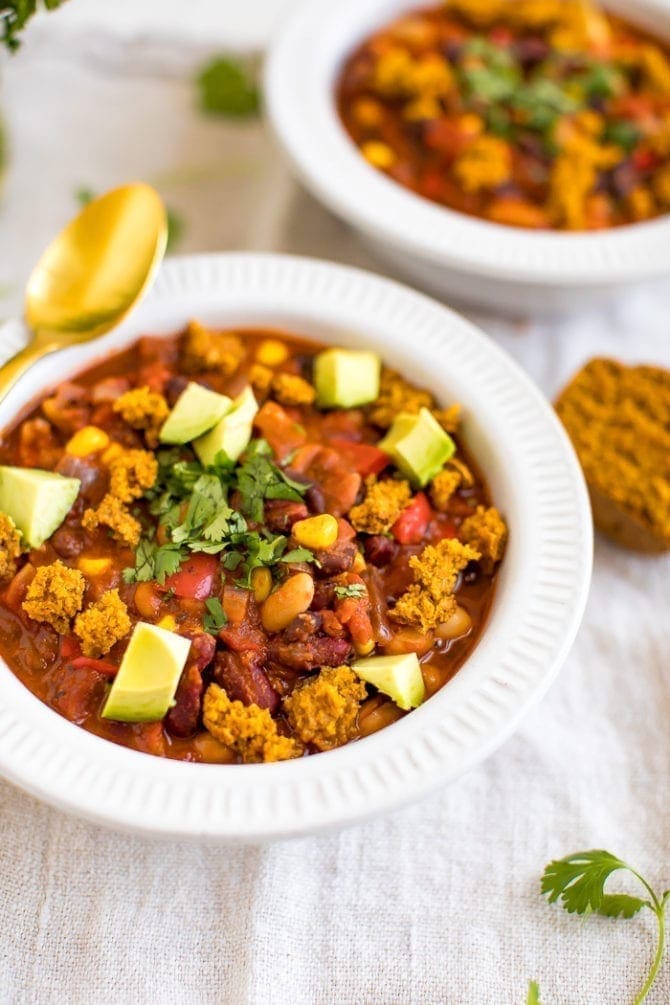 Two bowls of vegetarian chili.