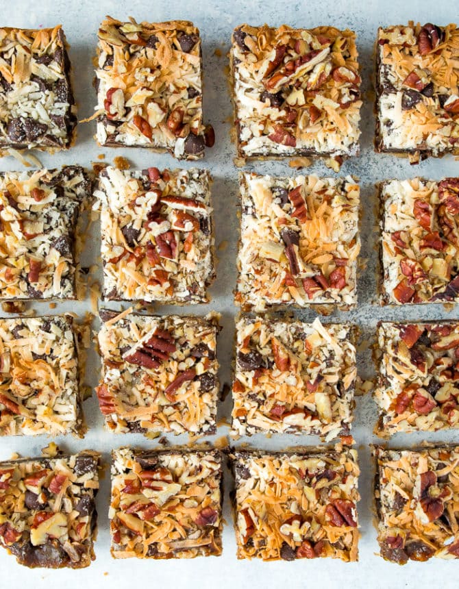 Healthier magic cookie bars. An almond flour cookie crust topped with coconut caramel, coconut, pecans, and chocolate chips.