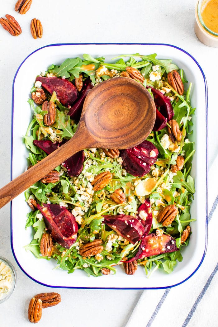 Beet salad with arugula and balsamic dressing eating bird food
