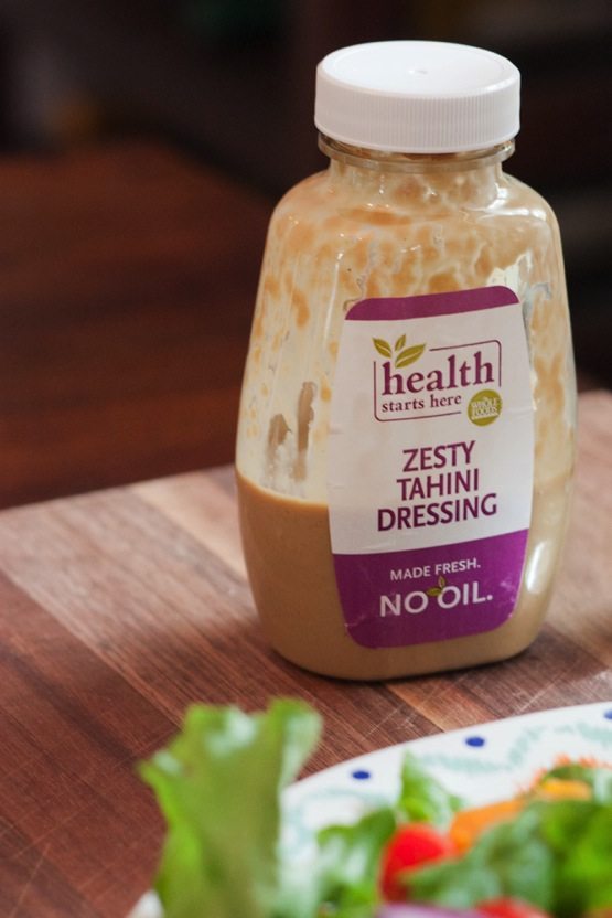 A jar of Whole Foods Zesty Tahini Dressing.