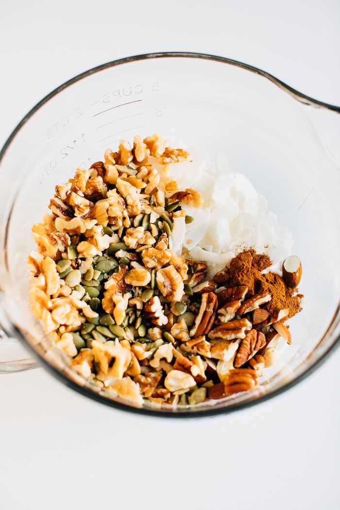 All the ingredients for grain-free granola in a bowl. 