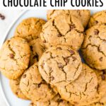 Plate piled with tahini chocolate chip cookies.