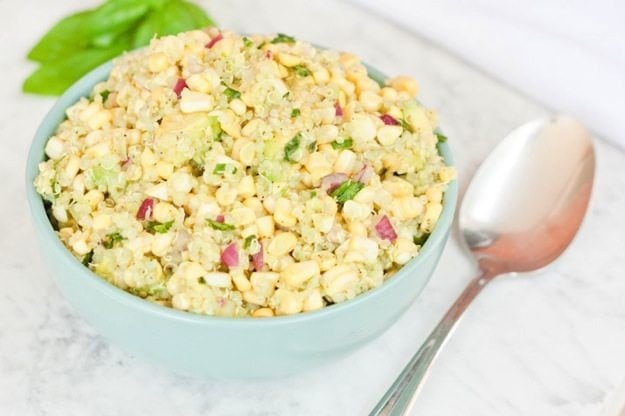Fresh Corn, Avocado and Quinoa Salad (or dip) in a blue bowl.