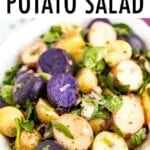 Tri-colored fingerling potato salad with shallots and spinach.