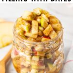 Raw apple pie filling a glass jar.