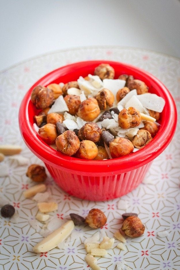 Pumpkin Spice Roasted Chickpea Trail Mix Pumpkin Spice Roasted Chickpea Trail Mix in a red ramekin.