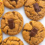 Photo of peanut butter blossom cookies next to each other.