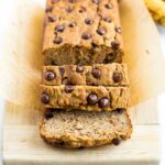 Loaf of chocolate chip coconut flour banana bread with slices.