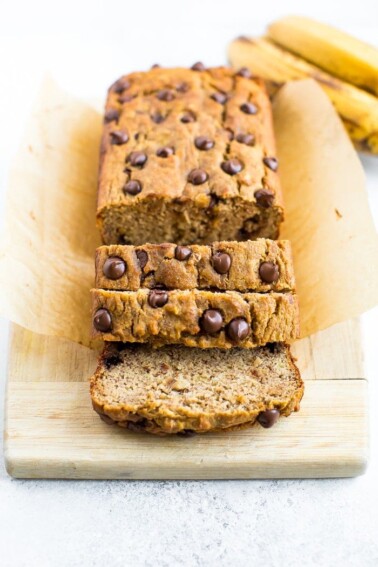 Loaf of chocolate chip coconut flour banana bread with slices.