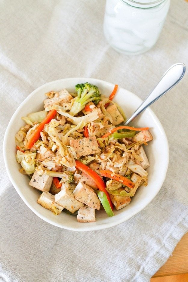 A bowl of tofu with cabbage noodles.