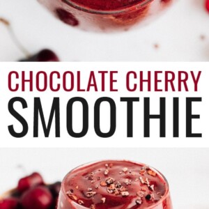 Chocolate cherry smoothie in a glass and topped with cacao nibs.