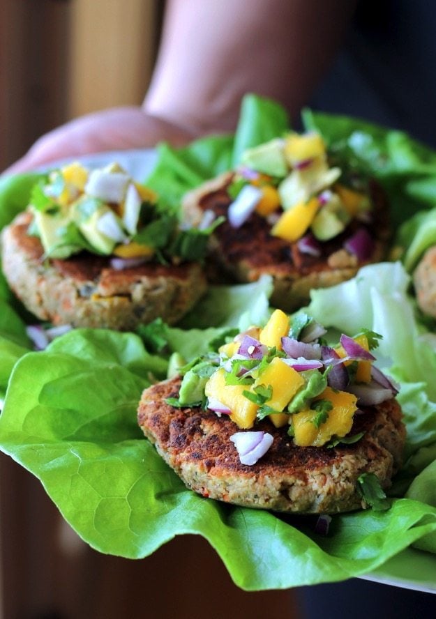 Jalapeño Chickpea Lentil Burgers with Sweet Mango Avocado Pico on lettuce wraps