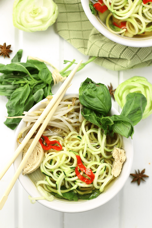 White bowl with Healthy Chicken Pho with Zucchini Noodles