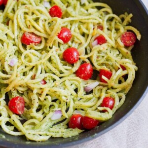 Rutabaga Pasta with a Creamy Pesto Sauce in a sauté pan.