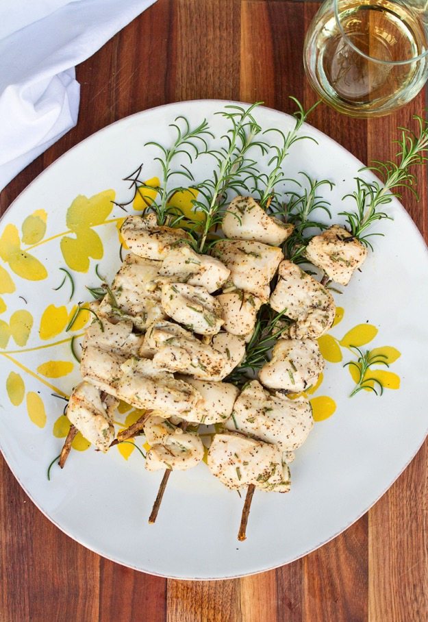 A plate of rosemary chicken skewers.