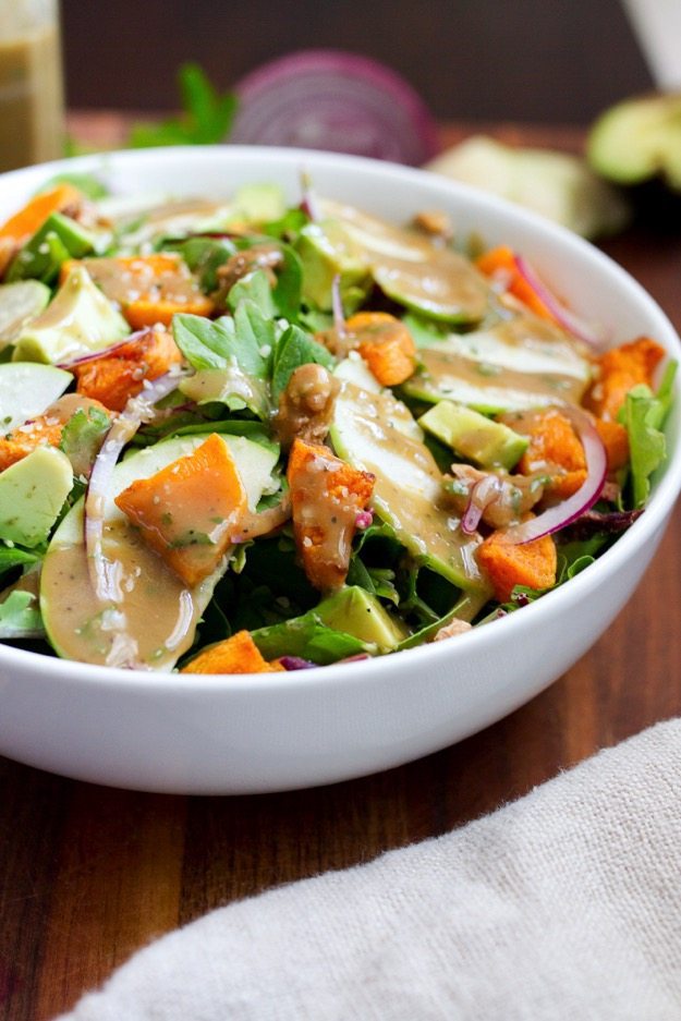 Fall Harvest Breakfast Salad with cinnamon roasted butternut squash and red onion, freshly diced apples, avocado slices, toasted walnuts and hemp seeds.