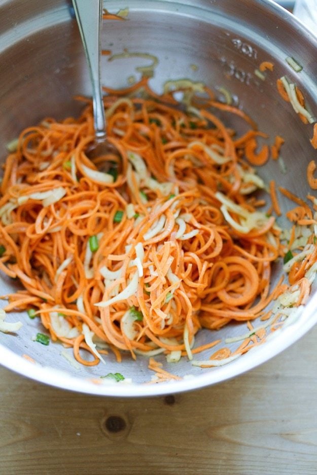 Spiralized Latke Mix in a mixing bowl.