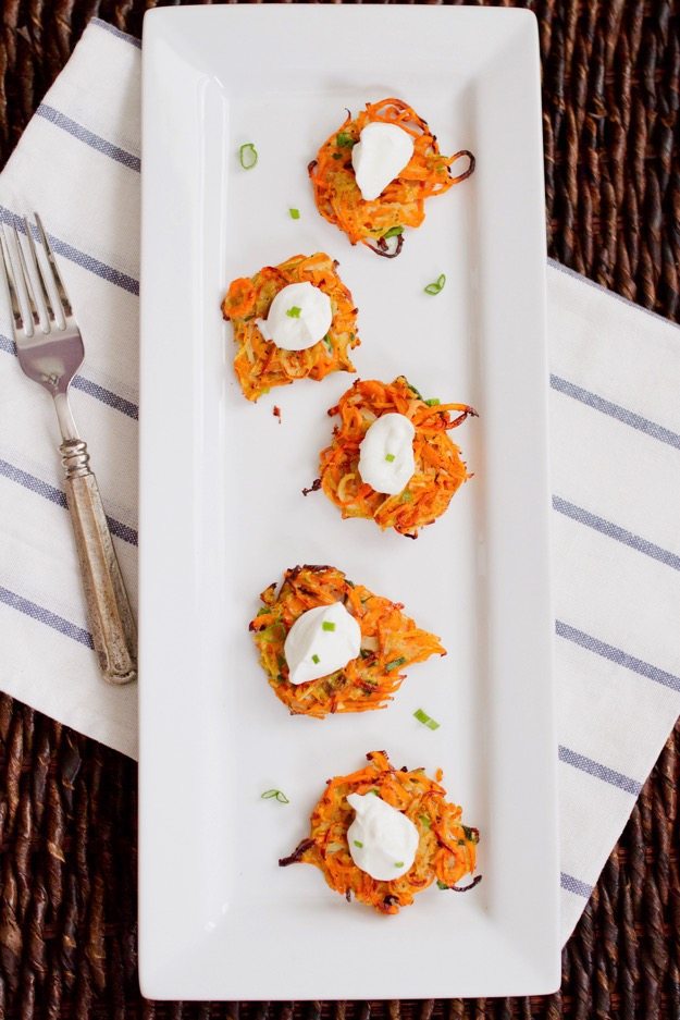 Sweet Potato and Parsnip Spiralized Latkes on a serving platter.