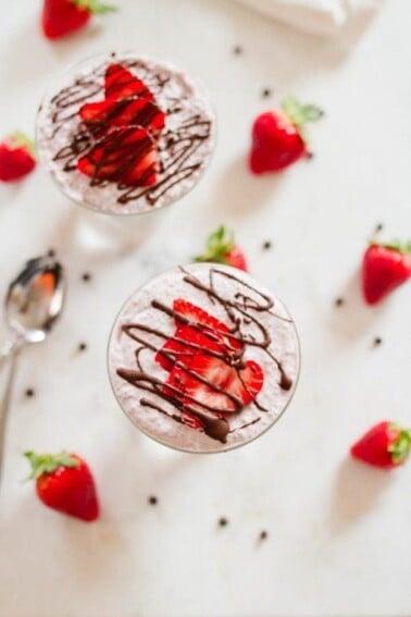 Chocolate Covered Strawberry Chia Pudding with creamy coconut milk, strawberries and a chocolate drizzle.