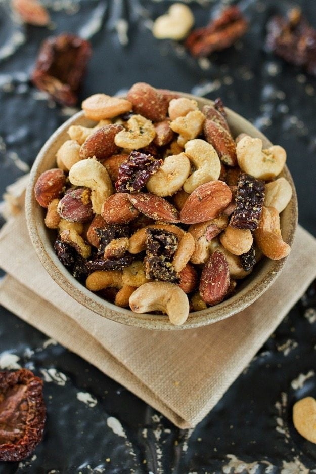 A savory mix of roasted nuts with sun-dried tomatoes and Italian seasonings, this Pizza Trail Mix is the ultimate snack. 