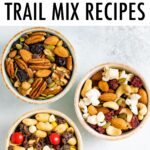 Three bowls of trail mix.