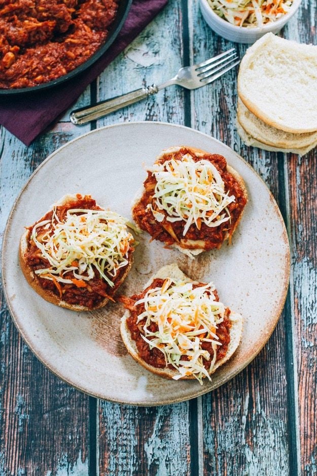 The BEST vegan BBQ sandwiches made with shredded hearts of palm, homemade BBQ sauce and a crunchy apple cider vinegar coleslaw. 