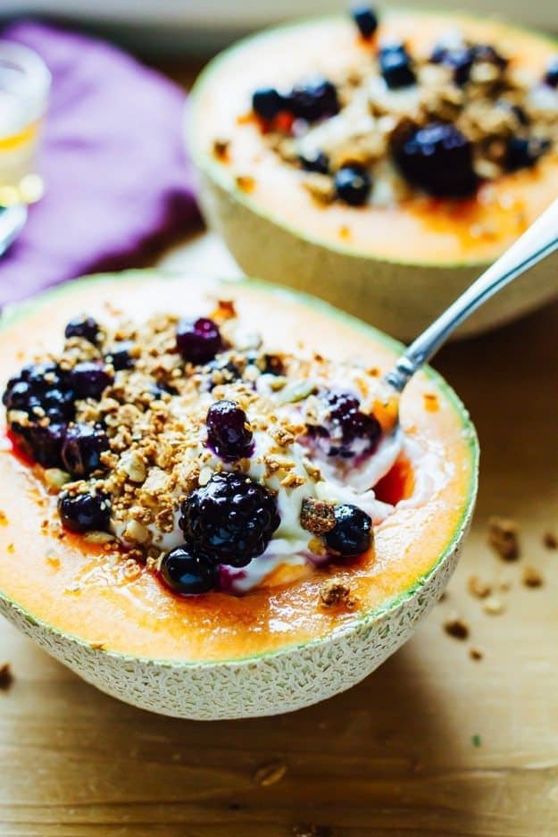 Cantaloupe Breakfast Bowls with Greek Yogurt, Berries, Granola and Honey