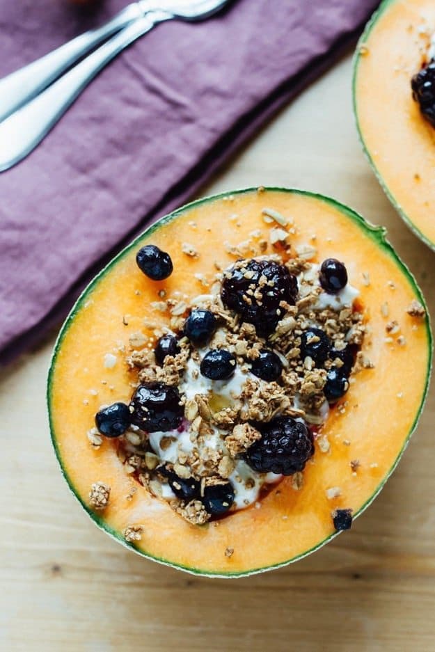 Cantaloupe Breakfast Bowls with Greek Yogurt, Berries, Granola and Honey