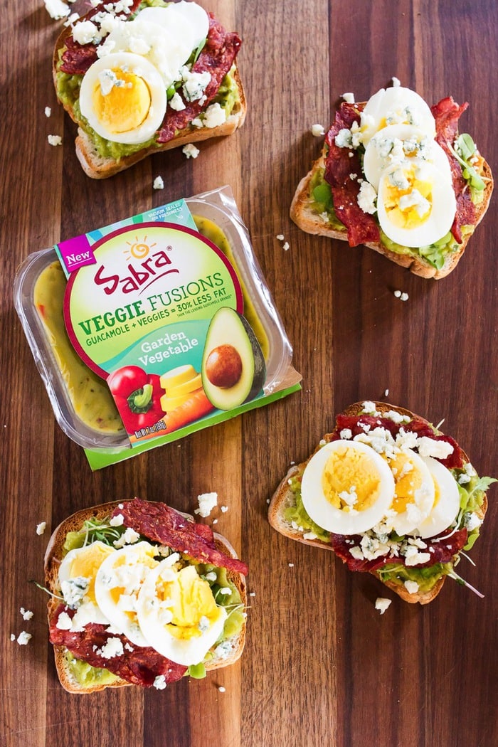 Veggie-packed cobb salad avocado toast with Sabra's New Veggie Fusions.
