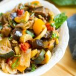 Closeup photo of ratatouille in a serving dish.