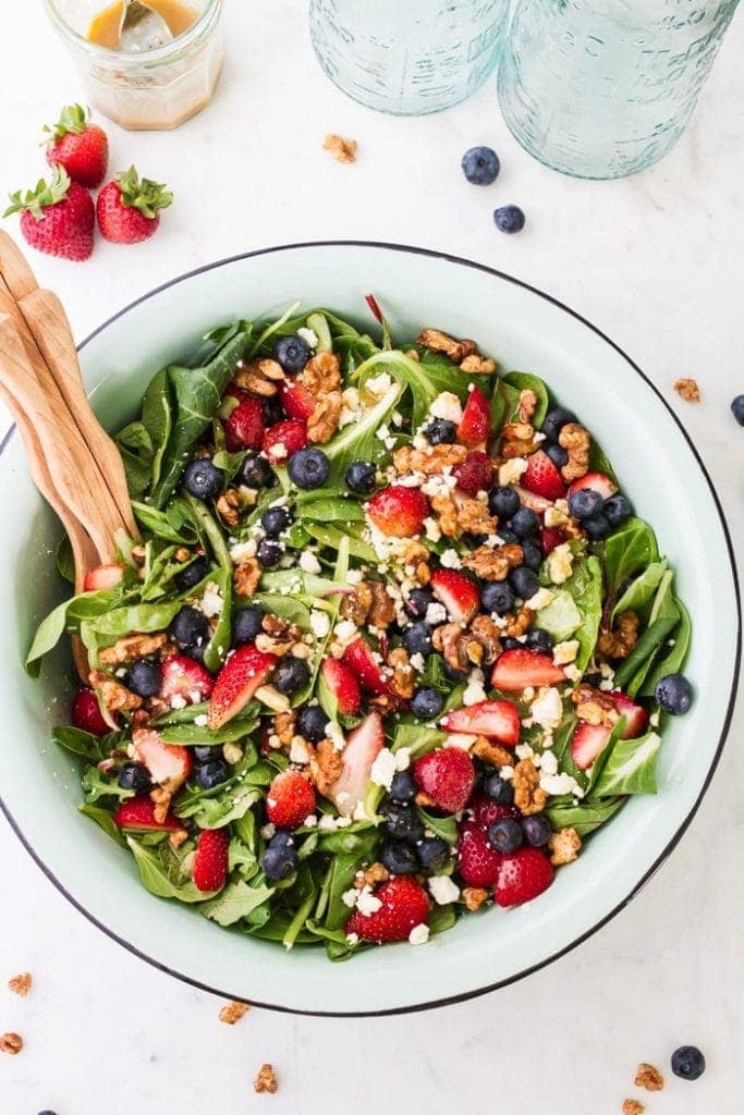 salad bowl with berry salad with maple walnuts