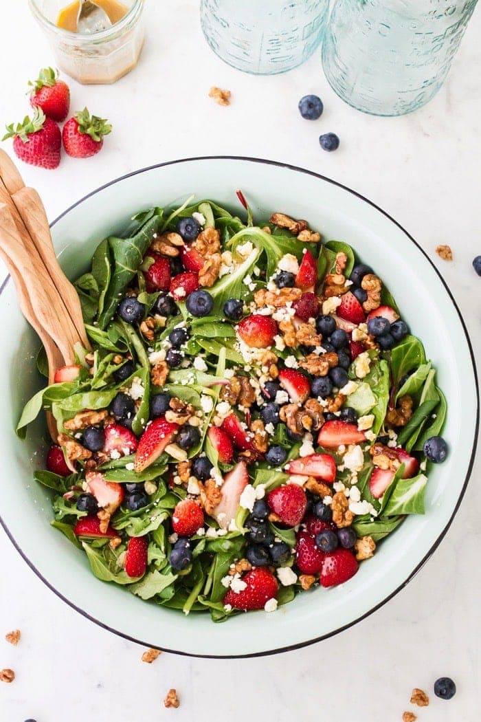 Patriotic berry salad loaded with fresh berries, crunchy maple walnuts and blue cheese. The red white and blue theme makes it perfect for the 4th of July. 