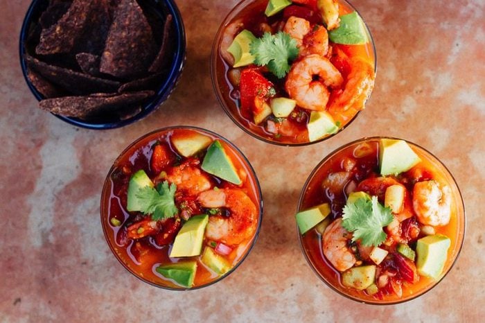 Mexican shrimp cocktail with tomatoes, cilantro and avocado served with black bean chips.
