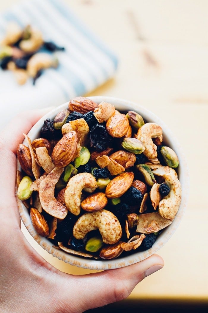 A delicious Breakfast Trail Mix with maple cinnamon roasted nuts, coconut flakes and dried berries. Perfect for eating on its own or as a topping for yogurt or oatmeal. 