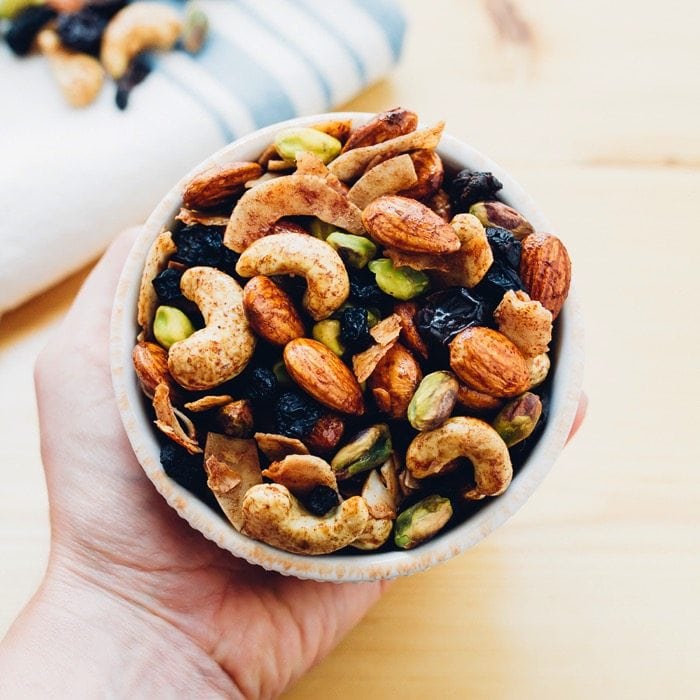 A delicious Breakfast Trail Mix with maple cinnamon roasted nuts, coconut flakes and dried berries. Perfect for eating on its own or as a topping for yogurt and oatmeal. 