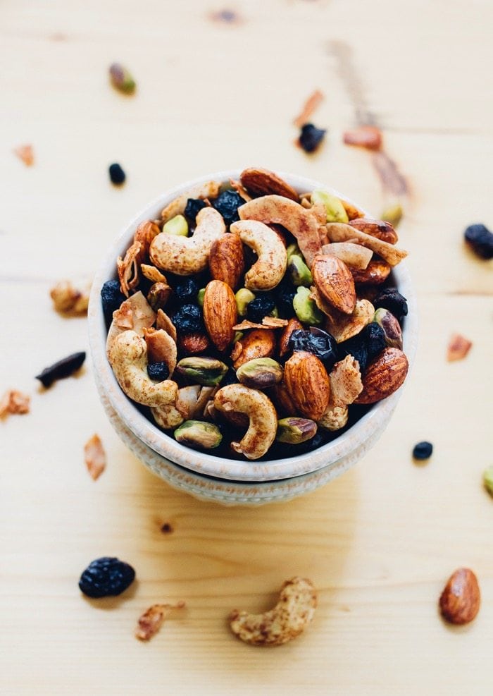 A delicious Breakfast Trail Mix with maple cinnamon roasted nuts, coconut flakes and dried berries. Perfect for eating on its own or as a topping for yogurt or oatmeal. 